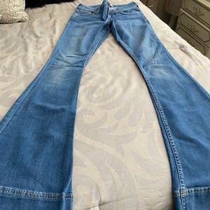 Alice and Olivia flare leg jeans.
